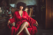 © Kaspars Grinvalds - Alluring woman in red silk robe on a vintage armchair