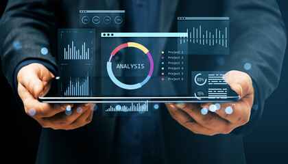 Poster - Businessman holding tablet with digital financial analysis dashboard, charts, and KPI infographics on futuristic virtual interface display.