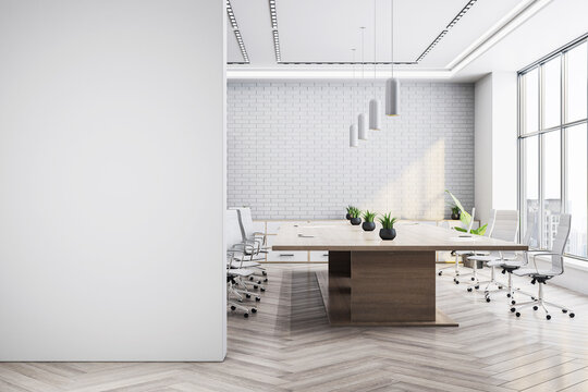 Modern luxury conference room interior with blank white wall, glass windows, and minimalist furniture design in corporate office setting. 3D Rendering