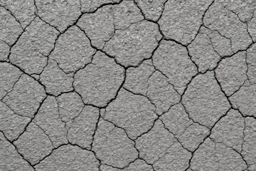 Poster - Surface featuring fractured rough asphalt texture