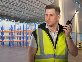 Poster - Man near empty warehouse. Guy with walkie-talkie stands near evening hangar. Storekeeper in reflective vest. Man near building with empty shelves. Portrait of warehouse security guard.