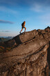 © EVERST - Active man trail running on mountain ridge in Norway travel hiking adventure outdoor, healthy lifestyle extreme vacations runner training endurance motivation sport concept