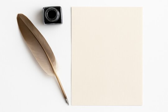 Elegant writing set featuring a feather quill, inkpot, and paper on a white surface, top-down perspective with space for customization