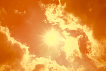 Wall Mural - Orange sky with clouds during hot summer weather