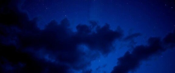 Wall Mural - Dark blue cloudscape, white stars, deep blue palette Majestic, abstract night sky Perfect for tech backgrounds,  wallpaper,  space
