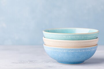 Poster - stacked bowls with matching decorative patterns on edge of countertop