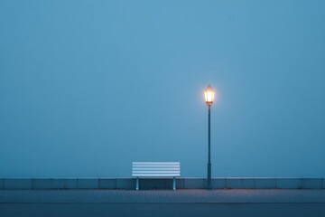 Poster - solitary city bench under streetlamp on quiet urban sidewalk at dusk