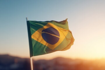 Poster - brazilian flag waving proudly with sunrise in background
