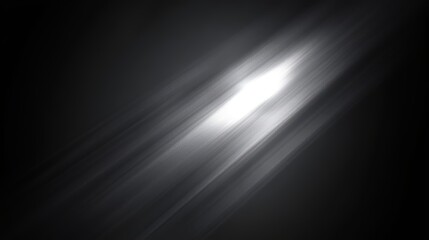 Poster - Black and white photo of a light shining on a dark background. The light is the only thing that is visible in the photo