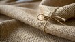 © Pixel Commerce Co - Closeup of burlap fabric with a tied string