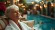 © Digital Snapshots - A mature senior woman enjoys a relaxing spa treatment, selfcare, vacation