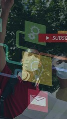 Poster - Animation of network of media icons over two male friends in face masks reading map in street
