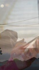 Poster - Animation of clock over businessman using tablet and electricity pylons
