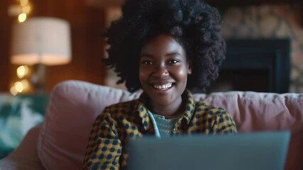 Aufkleber - A person typing away on their laptop from the comfort of a cozy couch, perfect for remote work or studying