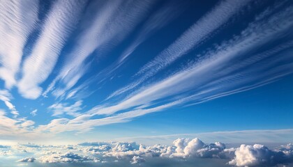 Wall Mural - a vast expanse of fluffy white clouds fills the sky beneath wispy streaks creating a serene and airy
