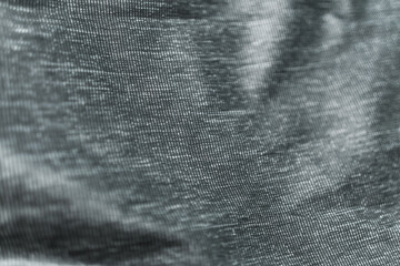 Poster - An abstract view of dark black and white fabric with a subtle ribbed texture creating depth and visual interest. Perfect as a background or overlay, adding a touch of elegance and sophistication. 