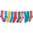 © Suryani - A vibrant collection of striped and polka dot socks in various colors hangs neatly on a clothesline, held by wooden clothespins, symbolizing laundry day or cheerful fashion.