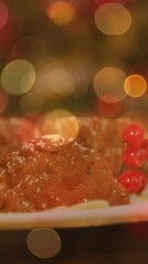 Poster - Animation of plate with christmas pudding and glowing lights