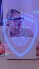 Poster - Animation of digital shield with padlock over happy caucasian female and male coworkers