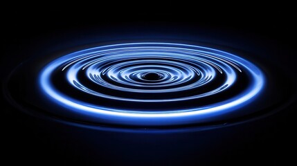 Poster - Concentric ripples in a dark blue surface.