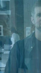 Poster - Animation of statistical data processing over caucasian man smiling at office