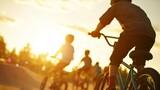 Silhouette of children riding BMX bikes at sunset.  Active lifestyle, friendship, summer fun.