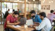 © N7 - Blurred coworking space with Indian team collaborating on business project