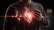 © Zahid - A person clutching their chest with a glowing heart symbol indicating pain or health issue