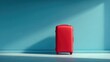 © Boonnam Burart - Vibrant red suitcase standing upright with shadow on clean backdrop