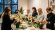 © Ipramana - A group of women are creating floral arrangements at a workshop, focusing on the flowers and design.