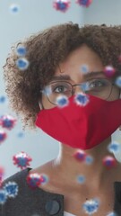 Poster - Animation of covid 19 cells over woman in office wearing face mask