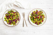 © Westend61 - Quinoa and edamame salad with pomegranate seeds and mint on a white background