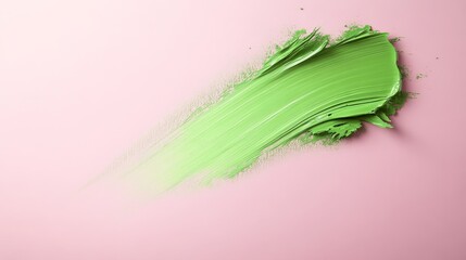 Aufkleber - Wide green paint stroke on pastel pink background showing texture and bristle marks, artistic macro shot with dynamic movement and vibrant color contrast