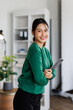 © David - Business, finance and employment, asian female successful entrepreneurs concept. Friendly smiling in office manager greeting new coworker. Business asian woman hold laptop