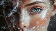© Juan - Closeup portrait of woman with snow particles on face for fantasy winter beauty makeup photography creative visuals concept