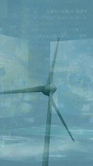 Poster - Animation of graph with numbers and globes against rotating windmill against clear sky