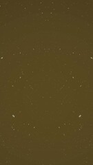 Poster - Animation of snow falling with copy space over brown background