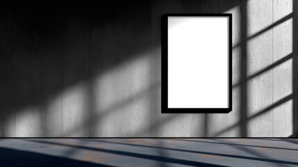 Poster - Minimalist interior with a blank frame on a concrete wall, sunlight casting shadows, serene ambiance