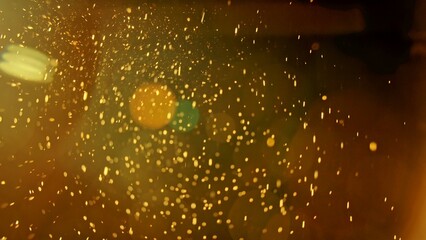 Poster - Warm glowing dust particles in golden light