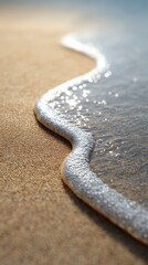 Poster - Crystal clear water gently laps the shore, creating a delicate white foam that embraces the golden sand, evoking tranquility and the serene beauty of a tropical paradise