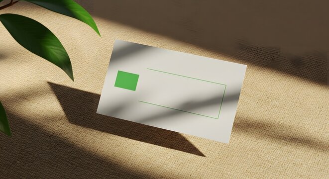 Blank white paper mockup with green element on beige surface