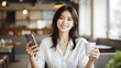 © Adombiz PNG - Cinematic Portrait of Thoughtful Woman with Smartphone in Cozy Café