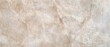 © Dovhas - The elegant marble texture with a warm beige tone and natural patterns.