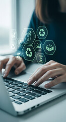 Poster - Close-up of hands using laptop, with digital icons symbolizing sustainability, recycling, and eco-friendly practices, representing corporate social responsibility and green business concepts