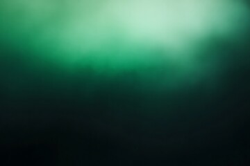 Wall Mural - abstract gradient of deep emerald green fading into darkness