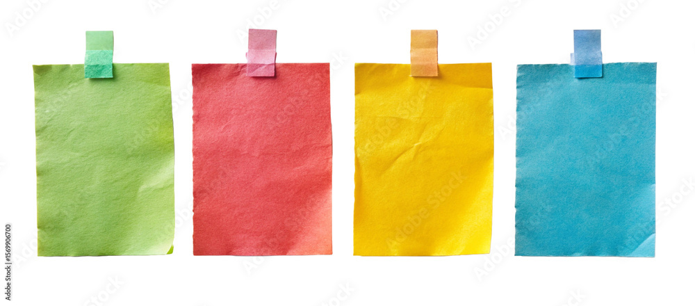 different colored sticky notes taped against wall isolated on white or ...
