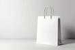 © Creuxnoir - A white paper bag sitting on top of a table.