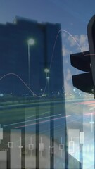 Leinwandbilder - Traffic light with tall buildings behind it 4k