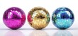 © Bohdana - The vibrant disco balls reflecting light in a festive arrangement.