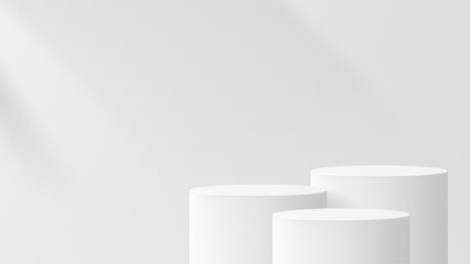 Poster - Empty white cylinder podiums with light shadow on clean wall. Minimal display stage for product presentation. Modern display base mockup.